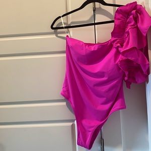 Be the SHOWSTOPPER that’s in your heart! Fashionable Swim Wear. NWT. Fit M or L
